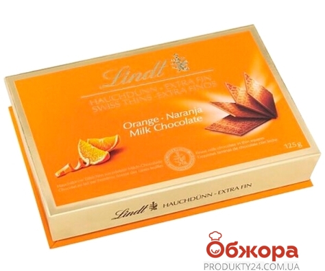 Цукерки Lindt 125г молочний шоколад з апельсином – ІМ «Обжора»